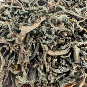Thé noir du Sri Lanka bio, infusion Ceylan bio, thé noir épicé bio, thé noir biologique du Sri Lanka, thé noir rafraîchissant bio, Ceylan certifié bio, thé vivifiant bio, thé noir aux agrumes bio, mélange de thé Ceylan bio, thé noir de qualité bio.