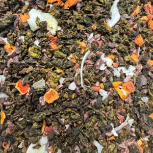 thé d'hiver, infusion gourmande, Milky Oolong bio, thé chocolaté, thé pomme et coco, thé au cacao, thé crémeux, thé exotique, thé bio de Noël, thé pour l'hiver, thé réconfortant, thé fruité et chocolaté, thé bio à la noix de coco, thé Milky Oolong, thé bio au cacao, thé pour les pauses d'hiver, thé gourmand