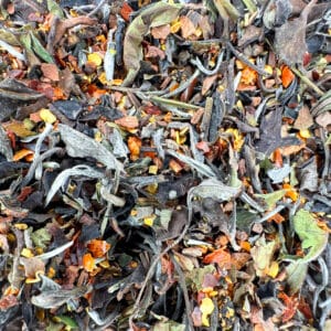 thé blanc épicé, thé blanc piment, thé blanc cannelle vanille, infusion épicée naturelle, thé blanc artisanal suisse, thé chaud épices, thé stimulant naturel, mélange épicé sans arôme